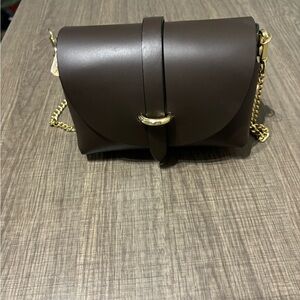 Genuine leather Chocolate colored mini crossbody bag from Venice